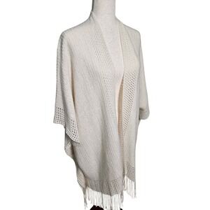 Cream Knit Kimono with open knit detail and tassles.  Open no closure.  One Size